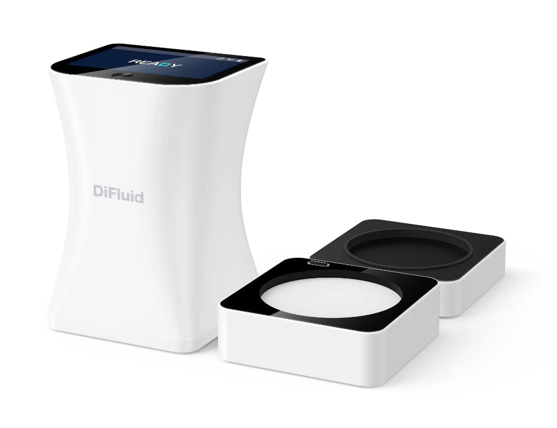 A white, compact DiFluid Omni Roast particle analyser with a touchscreen display and a black analysis sample tray.