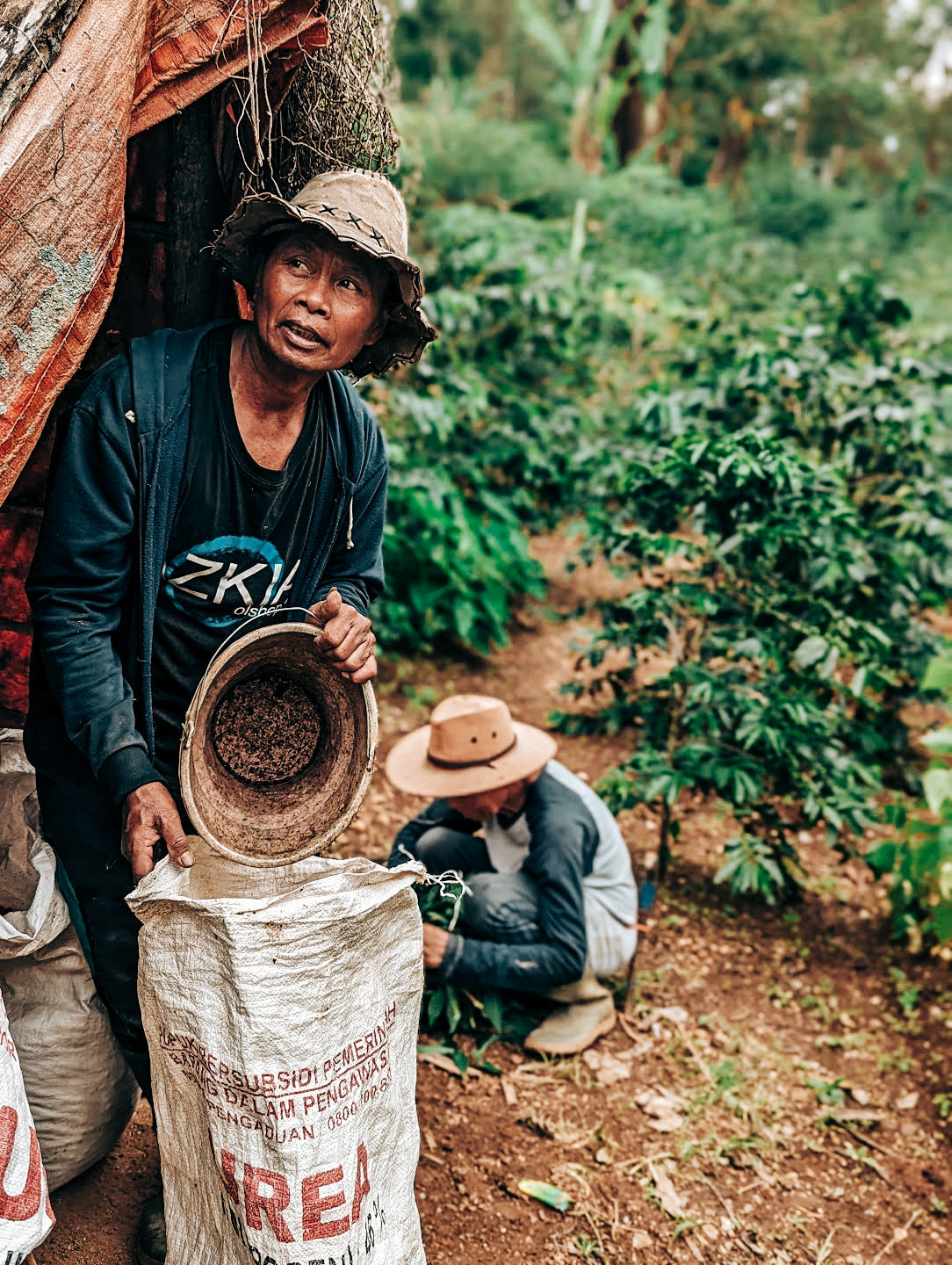 Natural Cipaganti producer with coffee sack