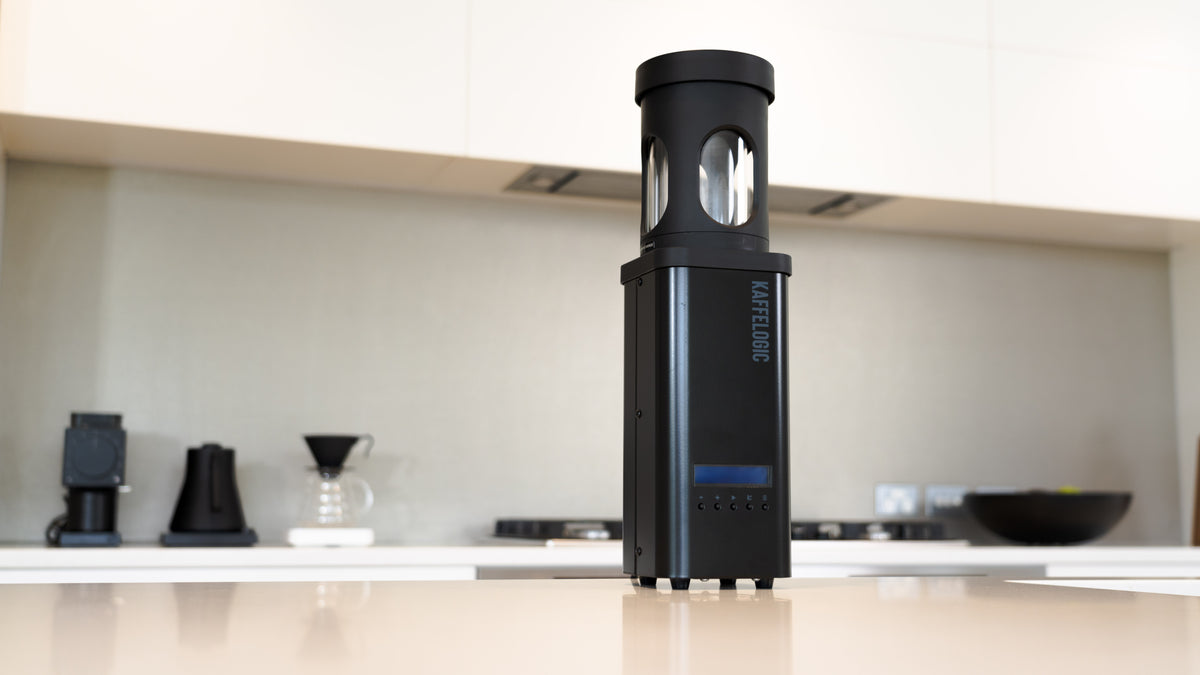 Kaffelogic Nano 7e benchtop coffee roaster on a kitchen counter